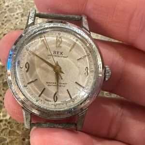 Rex Silver Analog Watch face